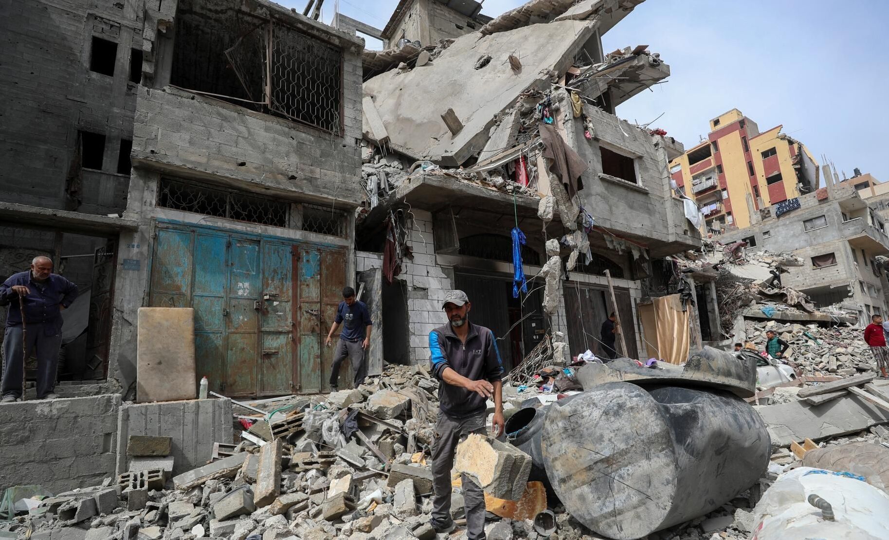 Israeli Strikes Kill 18 in Gaza, Including 13 Waiting for Food, Officials Say