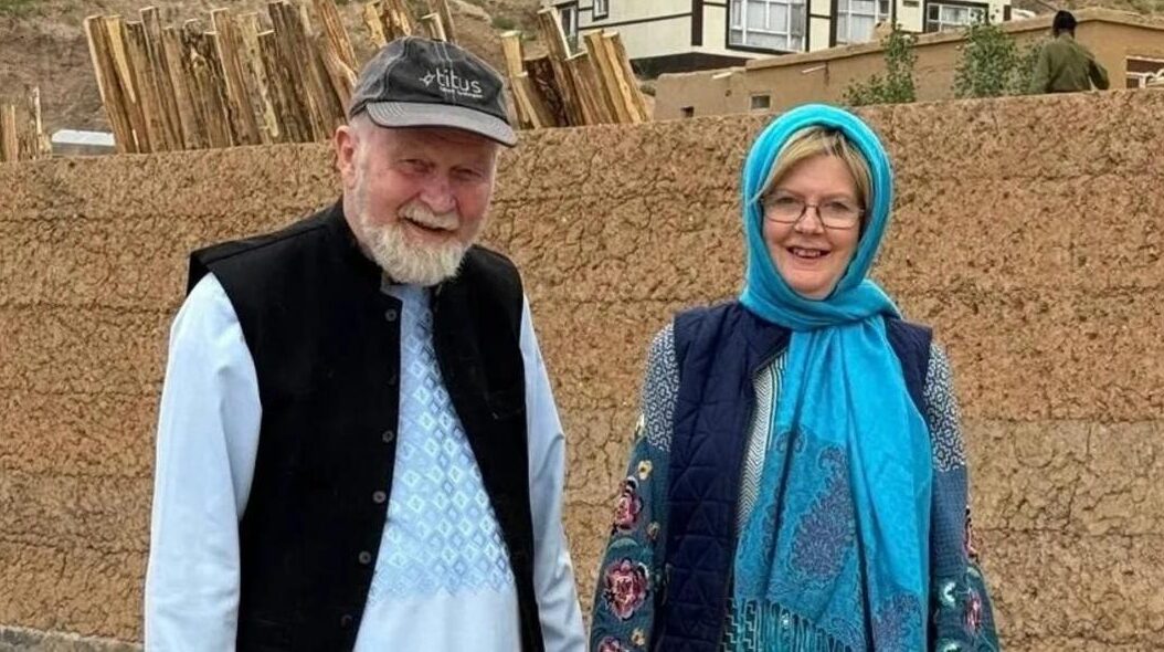 British couple freed by Taliban clinch son in emotional reunion
